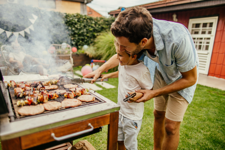 father and son backyard bbq